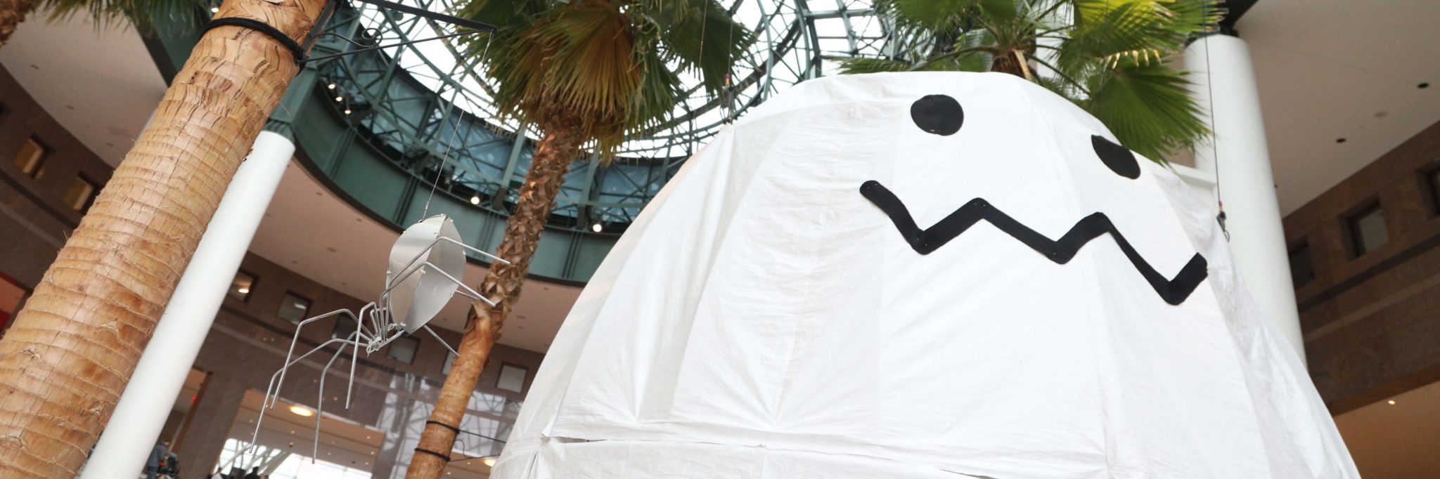 Ghost and Spider art installations in the Winter Garden Atrium for Halloween at brookfield place halloween bash
